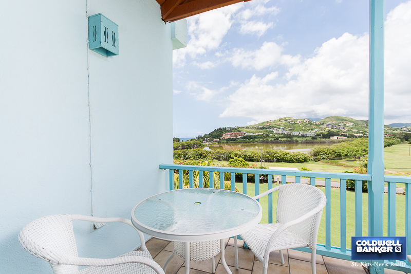 Living Room - Balcony from Oualie Realty