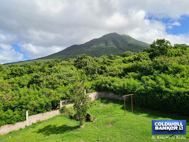  top floor view of nevis peak and fenced garden from Oualie Realty