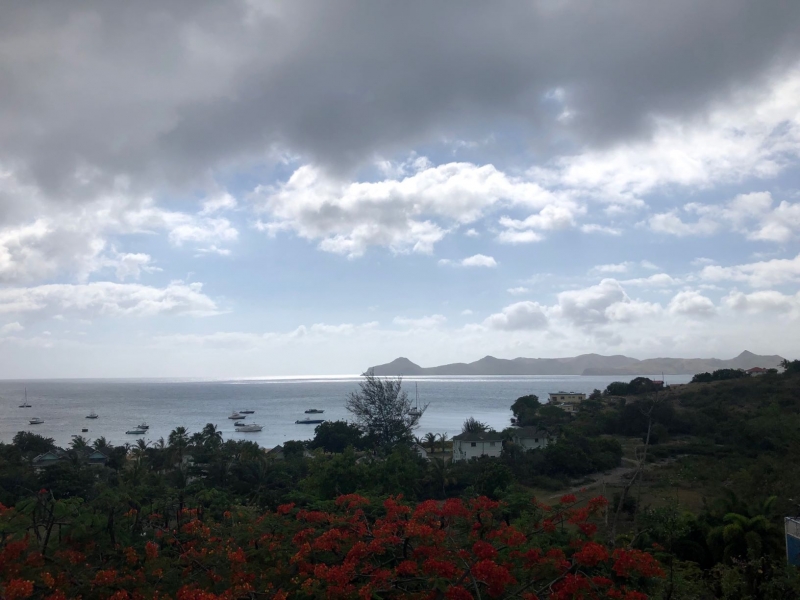 View of sunset and St Kitts to the West from Oualie Realty